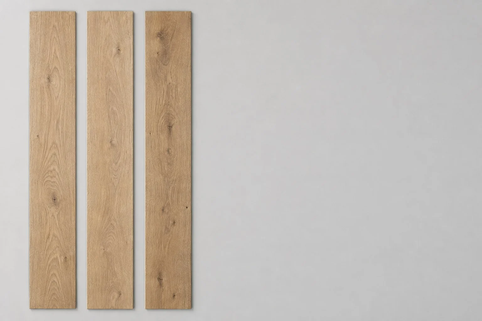 Three brushed engineered oak flooring planks laid side by side, without annotations