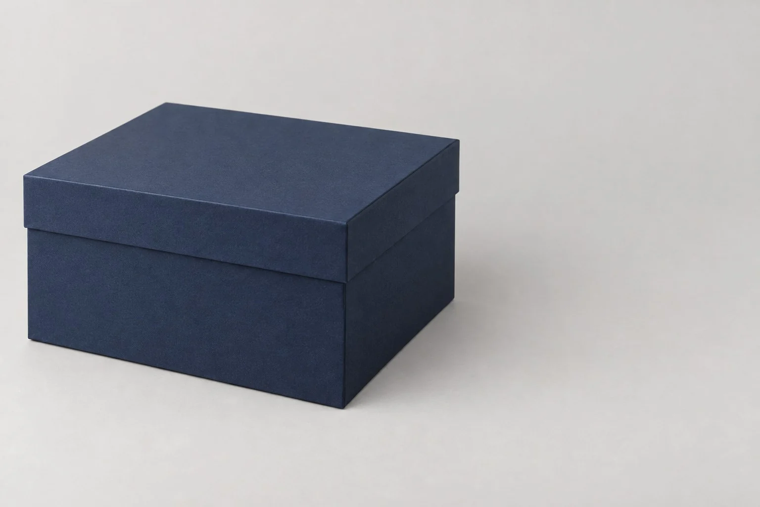Navy lid-and-base rigid gift box without annotations